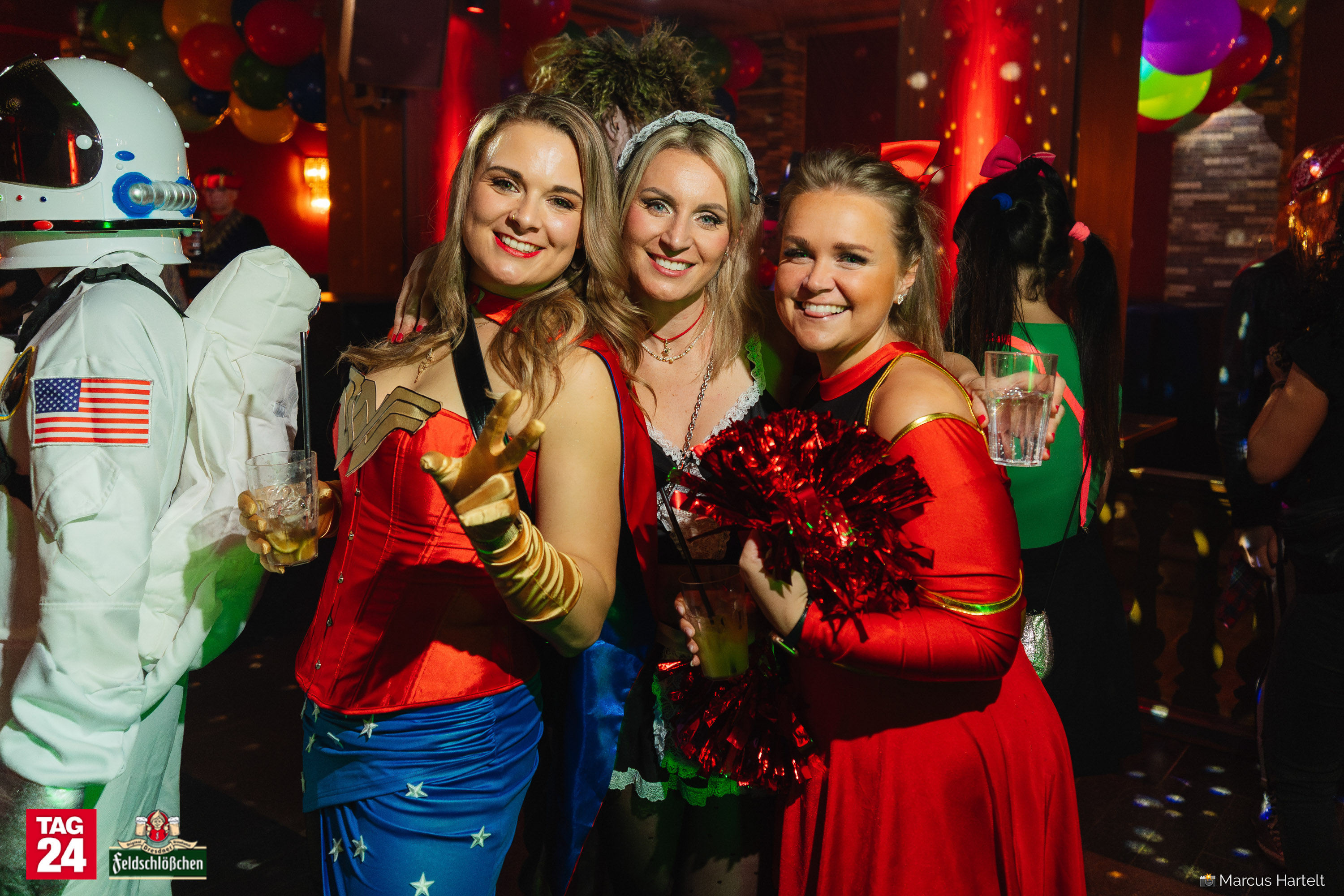  Three women in costumes pose for the camera at the Pichmännel carnival